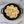 Baked biscuits in a cast iron skillet on a metal surface